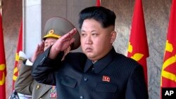 FILE - In this image taken from video, North Korean leader Kim Jong Un salutes during the ceremony to mark the 70th anniversary of the country's ruling party in Pyongyang, Oct. 10, 2015.