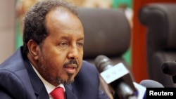 Somalia's President Hassan Sheikh Mohamed addresses a news conference at the African Union Headquarters in Addis Ababa May 26, 2013. 