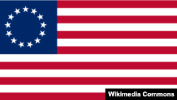 Early American flag with 13 stars representing the 13 states