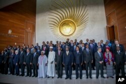 Participants gather for a group photo for the 28th Ordinary Session of the Assembly of the African Union, in Addis Ababa, Ethiopia, Jan. 30, 2017.