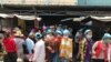 Garment workers take lunch break at Propitious (Cambodia) Garment Ltd, in Kandal Province, on March 20, 2020. (Kann Vicheika/VOA Khmer)