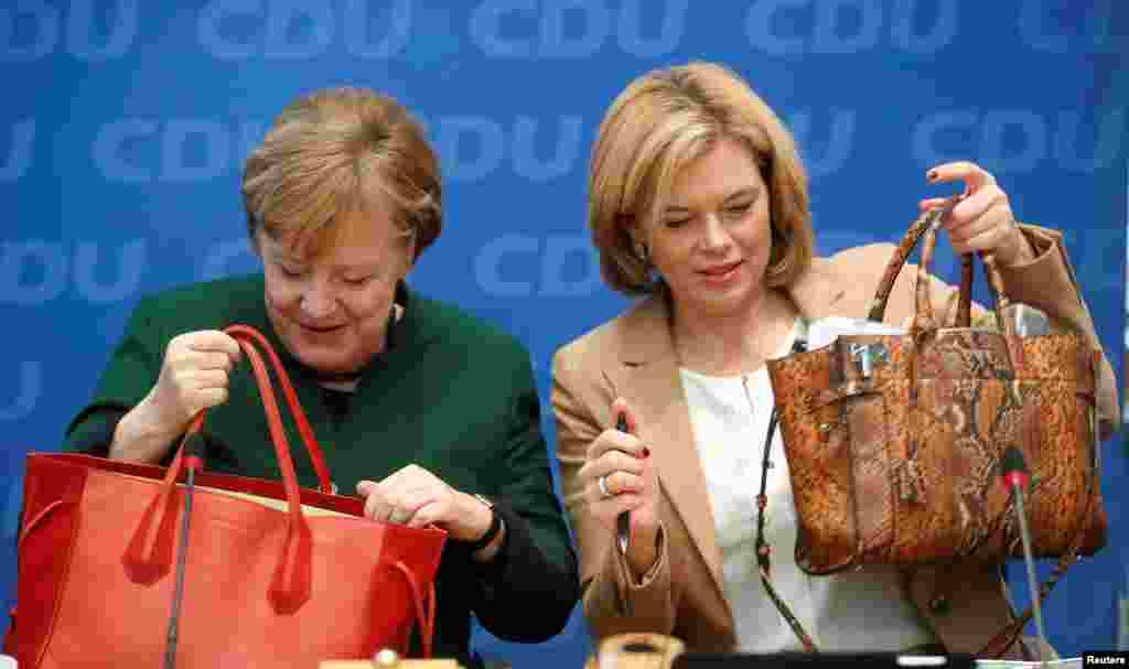 German Chancellor Angela Merkel and deputy leader of Christian Democratic Union Julia Kloeckner attend a party meeting at the Christian Democratic Union (CDU) headquarters in Berlin, Germany, Nov. 27, 2017.