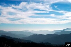 FILE - The Himalayan mountain range is seen on "International Mountain Day" from Shimla, India, Dec. 11, 2008.