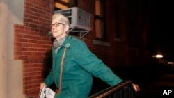 Jessica Leeds arrives at her apartment building, Oct. 12, 2016.