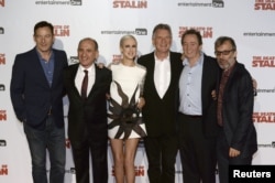 FILE - Actor Jason Isaacs, writer and director Armando Iannucci, actors Andrea Riseborough, Michael Palin, Paul Whitehouse and David Schneider at UK premiere of 'The Death of Stalin', in London, Oct. 17, 2017.