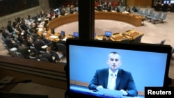 Nickolay Mladenov (on screen), United Nations Special Coordinator for the Middle East Peace Process, briefs the U.N. Security Council from Jerusalem on the situation in the Middle East as the Council meets on Israel and Palestinian territories at U.N. headquarters in New York, May 23, 2018. 