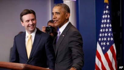 Obama surprises, thanks WH press secretary Josh Earnest during