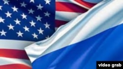 Прапори США та Росії