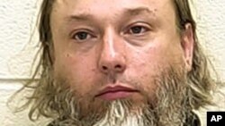 This undated photo provided by The Ford County Sheriff's Office in Paxton, Ill., shows Michael Hari. Hari, is the purported ringleader in the 2017 bombing of a Minnesota mosque.
