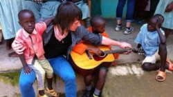 Dave Chapman with children at the Divine Providence Children's Home in Kakamega, Kenya