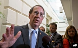 FILE - House Judiciary Committee Chairman Bob Goodlatte, R-Va., speaks with reporters.