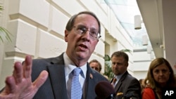 House Judiciary Committee Chairman Bob Goodlatte, R-Va., speaks with reporters after House Republicans worked on an approach to immigration reform in a closed-door meeting, July 10, 2013. 