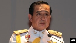 Gen. Prayuth Chan-ocha speaks at the start of his first press conference since the coup, May 26 , 2014, in Bangkok.