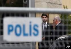 Security guards stand outside Saudi Arabia's consulate in Istanbul, Oct. 19, 2018.