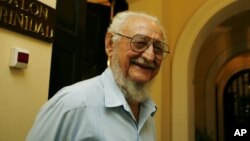FILE - Ramon Castro, Fidel Castro's older brother, speaks with journalists at the National hotel in Havana. Ramon Castro, who studied agricultural engineering, spent his life tending crops and livestock.