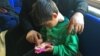 #EduApp4Syria: Designing Apps to School Syria's War-affected Kids