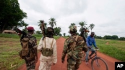 Seleka rebels, seen here July 15, 2013, in the town of Bria, Central African Republic. overthrew the previous president in March, and are accused of continuing to carry out atrocities in some of the most isolated corners of the country.