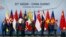 ASEAN leaders leave the stage following a group photo at their summit in Singapore, Nov. 14, 2018.