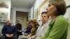 Elder abuse attorney and specialist Joy Solomon, right, speaks during a class at a condominium in New York, Jan. 7, 2014, on teaching doormen and building staff how to identify and what to do if they spot cases of elder abuse.