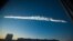 A meteorite contrail is seen over Chelyabinsk, February 15, 2013. 