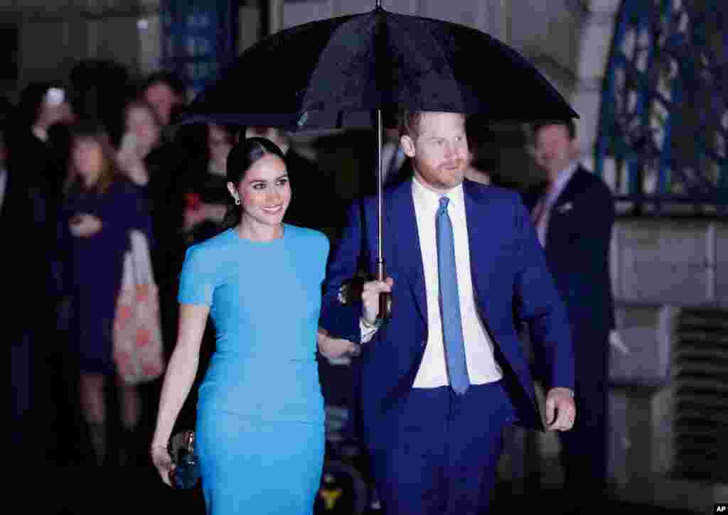 Britain&#39;s Prince Harry and Meghan, the Duke and Duchess of Sussex arrive at the annual Endeavour Fund Awards in London.