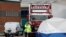 Police is seen at the scene where bodies were discovered in a lorry container, in Grays, Essex, Britain October 23, 2019. REUTERS/Peter Nicholls - 