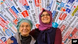 Hatice Cengiz, fiancee of murdered journalist Jamal Khashoggi, and Italian Senator Emma Bonino, left, at a press conference at the Foreign Press Association in Rome, Dec. 17, 2019.