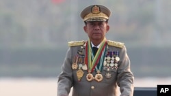 FILE - Senior General Min Aung Hlaing inspects officers during a parade to commemorate Myanmar's 78th Armed Forces Day in Naypyitaw, Myanmar, on March 27, 2023. China reaffirmed support for the junta leader at a meeting in Kunming, China, on Nov. 6, 2024.