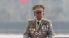 FILE - Gen. Min Aung Hlaing inspects officers during a parade to commemorate Myanmar's 78th Armed Forces Day in Naypyitaw, Myanmar, March 27, 2023. 