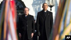 Presiden AS Barack Obama dan Presiden Perancis François Hollande dalam upacara penyambutan resmi di Gedung Putih, Selasa, 11 Februari 2014.