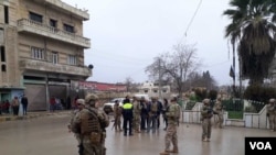 Escena de atentado suicida en Manbij, Siria, 16 de enero de 2019.