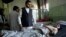 Wounded men lie on their beds in Wazir Akbar Khan Hospital in Kabul, Afghanistan, May 31, 2017. A massive explosion rocked a highly secure diplomatic area of Kabul Wednesday morning, causing casualties and sending a huge plume of smoke over the Afghan capital.