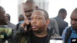 Nairobi governor Mike Gideon Mbuvi appears with other suspects accused of corruption, at the Mililani law court in Nairobi, Kenya, Dec. 9, 2019.