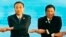 FILE - In this Sept. 7, 2016, photo, Chinese Premier Li Keqiang (L) and Philippine President Rodrigo Duterte link arms during the ASEAN Plus Three summit in Vientiane, Laos. After lashing out at longtime ally America, Duterte is making a state visit to Ch