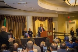Sudan's Prime Minister Abdalla Hamdok addresses members of the Sudanese diaspora in a Washington hotel during his recent visit to the U.S. capital. (Twitter - @SudanPMHamdok)