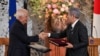 European Union foreign policy chief Josep Borrell, left, and Japanese Foreign Minister Takeshi Iwaya shake hands following a signing ceremony at the Iikura Guest House in Tokyo on Nov. 1, 2024.