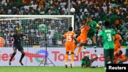 Nigeria's captain William Troost-Ekong scores a goal during the final of the 2023 Africa Cup of Nations against Ivory Coast, at Stade Olympique Alassane Ouattara, Abidjan, Ivory Coast, February 11, 2024.