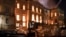 Salvaged equipment lies on the ground as flames engulf the 200-year-old National Museum of Brazil, in Rio de Janeiro, Sept. 2, 2018.