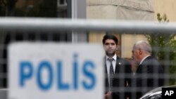 FILE - Security guards stand outside Saudi Arabia's consulate in Istanbul, Oct. 19, 2018. 