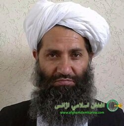 FILE - In this undated photo from an unknown location, released in 2016, the leader of the Afghanistan Taliban Mawlawi Hibatullah Akhundzada poses for a portrait. The Taliban have seized power in Afghanistan two weeks before the U.S. is set to…