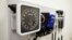 FILE - Medical equipment is pictured on the wall of an examination room in San Diego, California, Nov. 17, 2014.