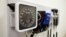 FILE - Medical equipment on the wall of an examination room in San Diego, Calif., Nov. 17, 2014.