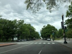 Food trucks usually line Virginia Avenue outside the State Department. But they've been gone since the coronavirus outbreak. Streets near Foggy Bottom are largely quiet. (Nike Ching/VOA)