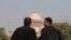 Supreme Court Lawyers speak to each other on the lawns of India's Supreme Court as it begins hearing dozens of petitions that seek revocation of a new citizenship law amendment in New Delhi, India, Jan. 22, 2020. 