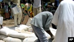 Food aid being distributed by USAID in Sudan. (file)