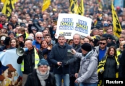 FILE - Flemish right-wing party President Filip Dewinter attends a protest against Marrakesh Migration Pact in Brussels, Belgium, Dec. 16, 2018.