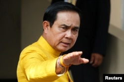 FILE - Thailand's Prime Minister Prayuth Chan-ocha arrives at a weekly Cabinet meeting at Government House in Bangkok, Thailand, May 16, 2016.