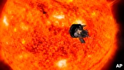 This illustration from NASA shows the Parker Solar Probe spacecraft approaching the sun. 