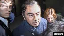 Former Nissan Motor Chairman Carlos Ghosn leaves his lawyer's office in Tokyo, Japan, in this photo taken by Kyodo April 3, 2019.