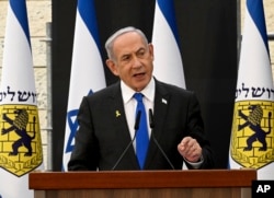 FILE — Israeli Prime Minister Benjamin Netanyahu speaks at a ceremony for the 'Remembrance Day for the Fallen of Israel's Wars and Victims of Terrorism' at Yad LeBanim in Jerusalem, Israel, Sunday, May 12, 2024.